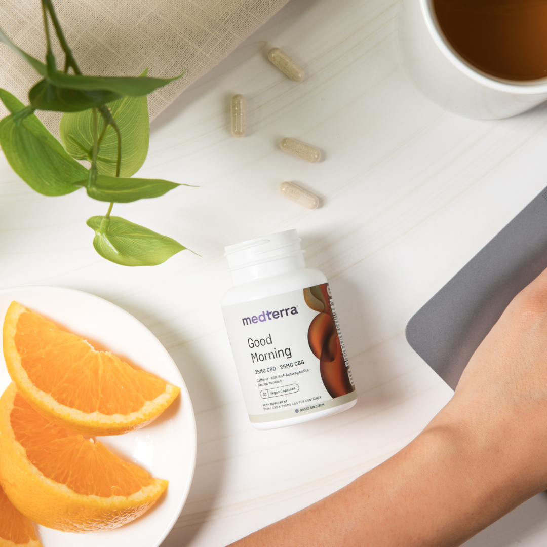 medterra Good Morning 25MG CBD 25MG CBG — Vegan Capsules Broad Spectrum bottle with capsules, orange slices and a cup of tea