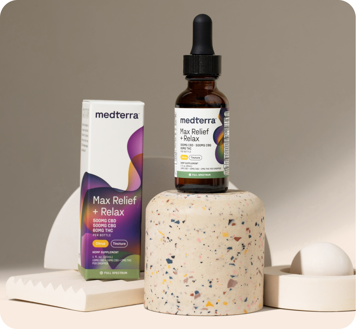 Front view of Medterra Max Relief + Relax tincture bottle and box showing 500mg CBD/500mg CBG on neutral backdrop
