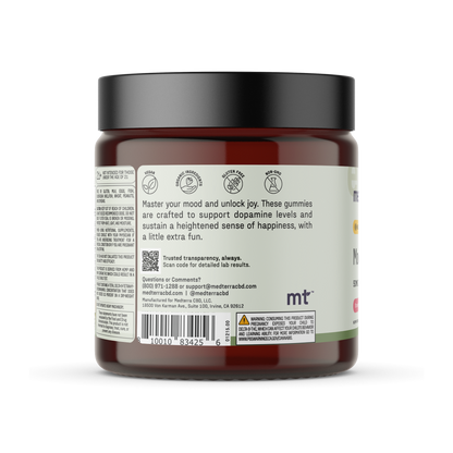 A brown jar of Medterra Mood Boost Gummies labeled with text promoting mood enhancement and dopamine support. The label provides a QR code for detailed lab results and includes contact information. The jar features a black lid and is branded with the "mt" logo on the side.