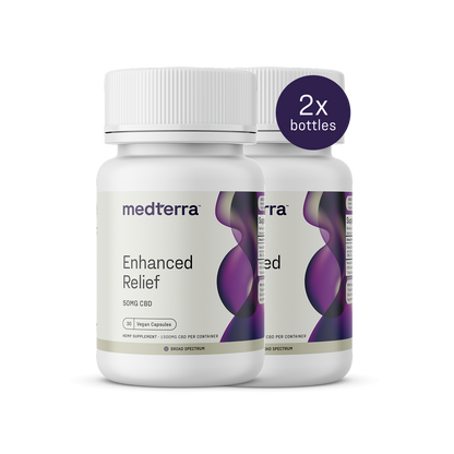 Two bottles of Medterra Enhanced Relief Broad Spectrum Capsules, each with 50mg of CBD, are shown. The label emphasizes "Vegan Capsules" and includes active cannabinoids for enhanced well-being. A "2x bottles" badge is visible in the upper right corner.